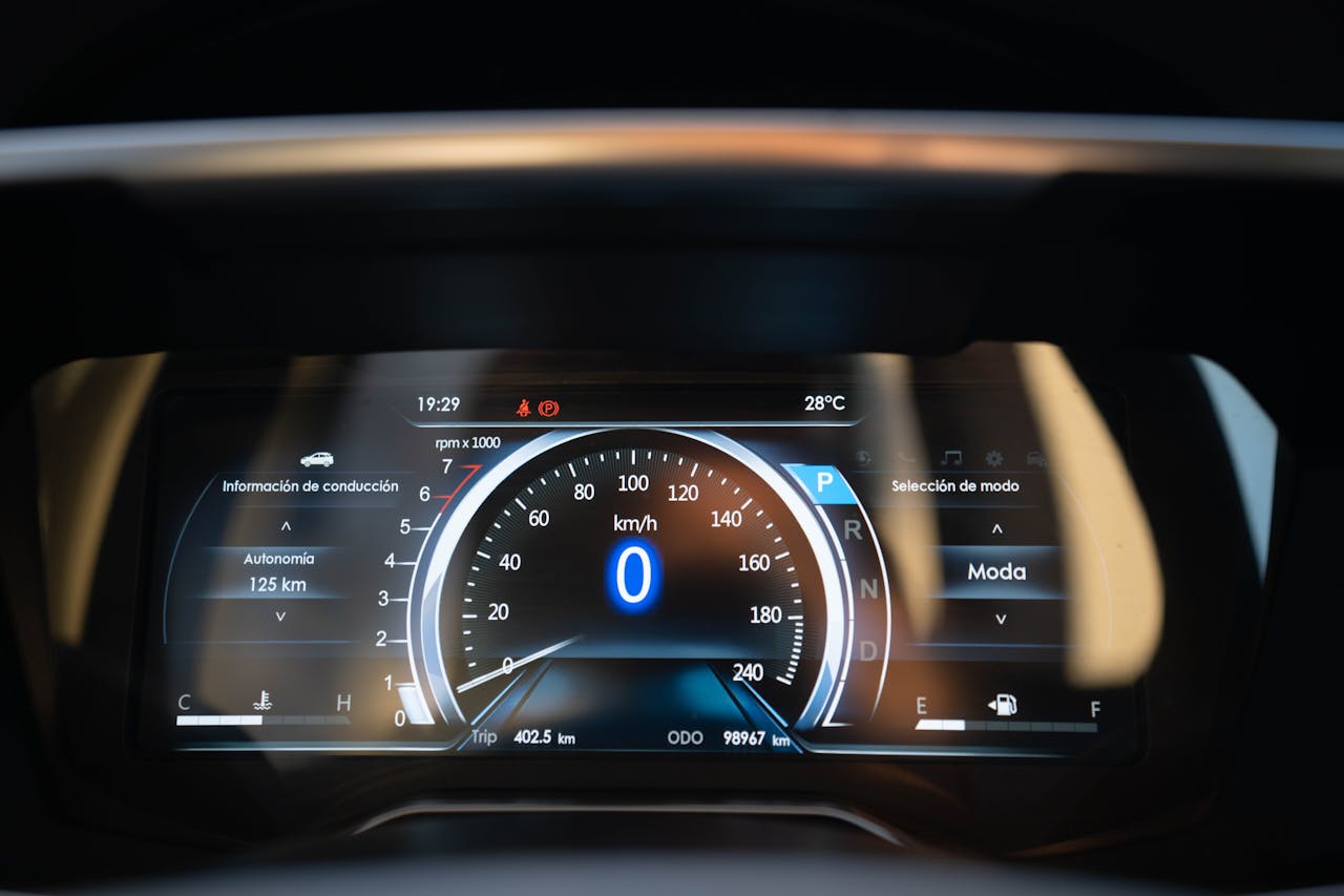 Close-up of a digital car dashboard in Buenos Aires, displaying a speedometer reading of zero km/h.